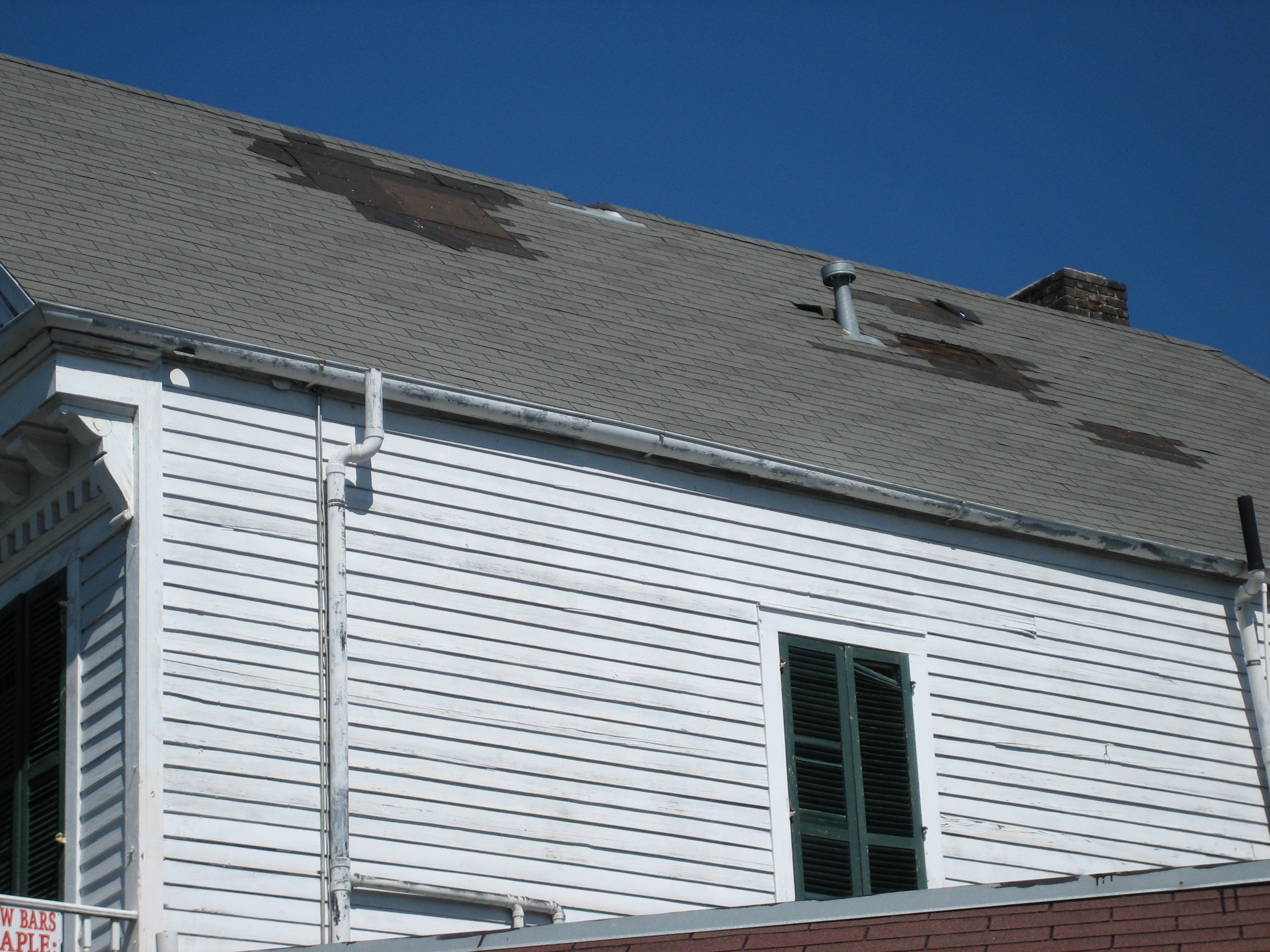 Damaged roof before replacement