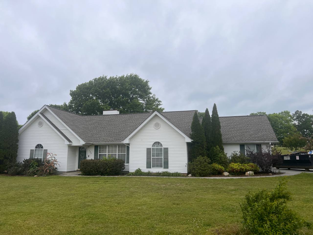 Crockett Construction crew working on a roof tear-off in Athens, TN